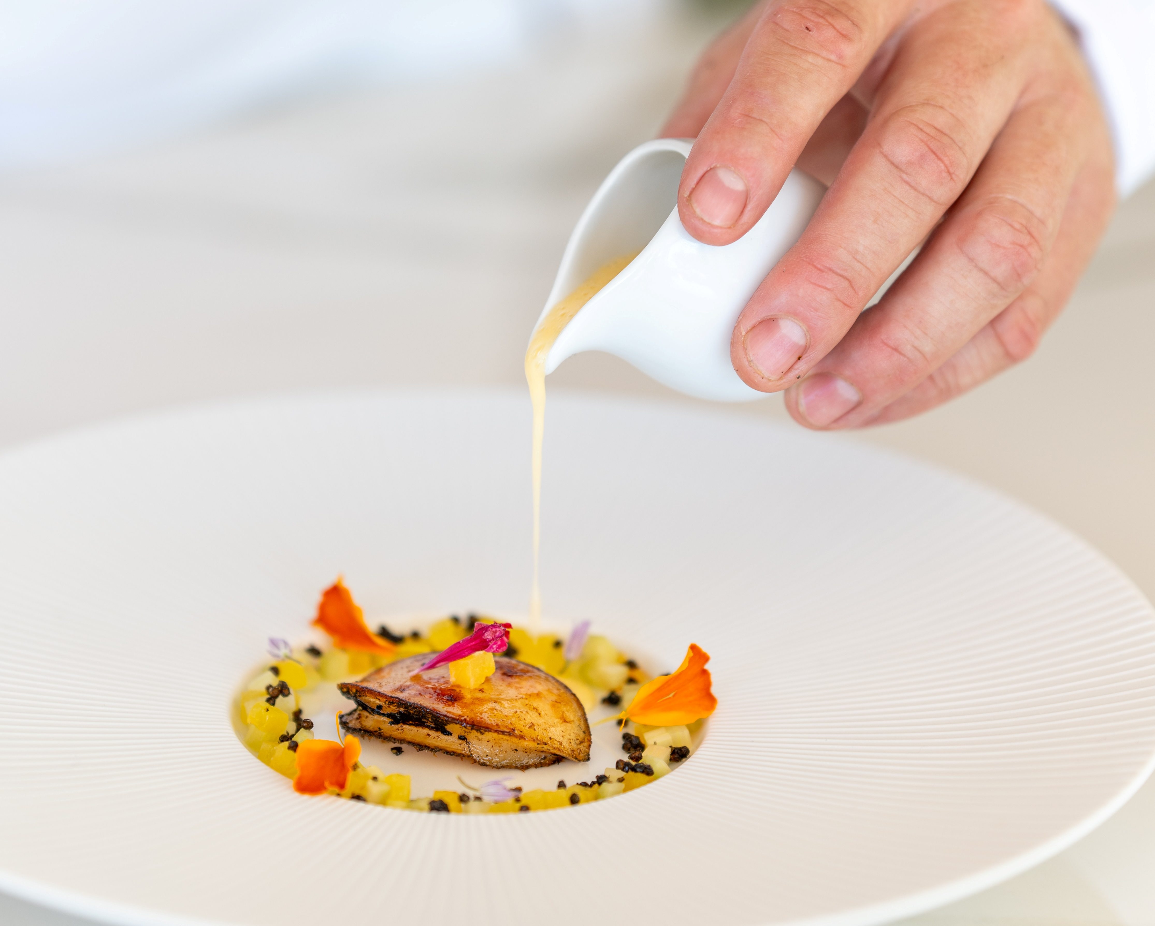 Assiette gastronomique du Chef Alain Montigny au restaurant L'Or Bleu 1 étoile Michelin, Tiara Miramar Beach Resort